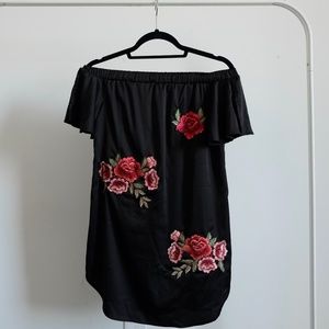 Off shoulder satin dress with rose appliqués
